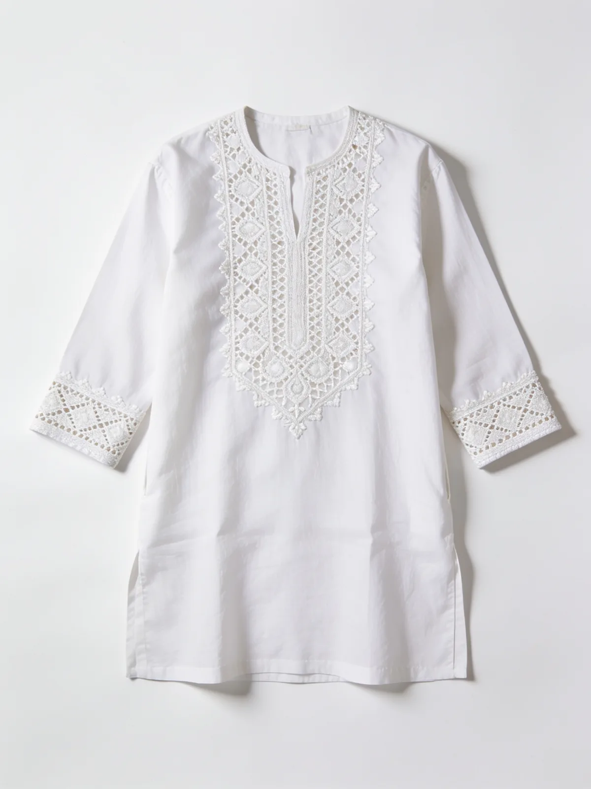 Flat-lay reference photo of a white chikankari kurta with diamond-lattice embroidery
