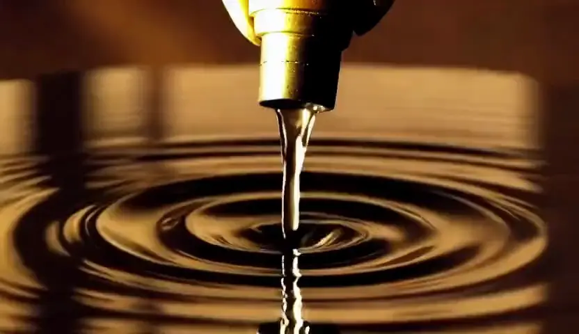Golden ink blooming through dark water, AI video loop