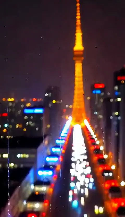Vertical shot of neon rain falling past a Tokyo window, bokeh city lights pulsing, cinematic warm-neutral color grade, soft directional key light, 35mm lens, shallow depth of field, natural skin tones, subtle film grain